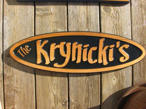 Engraved wood sign inverse text